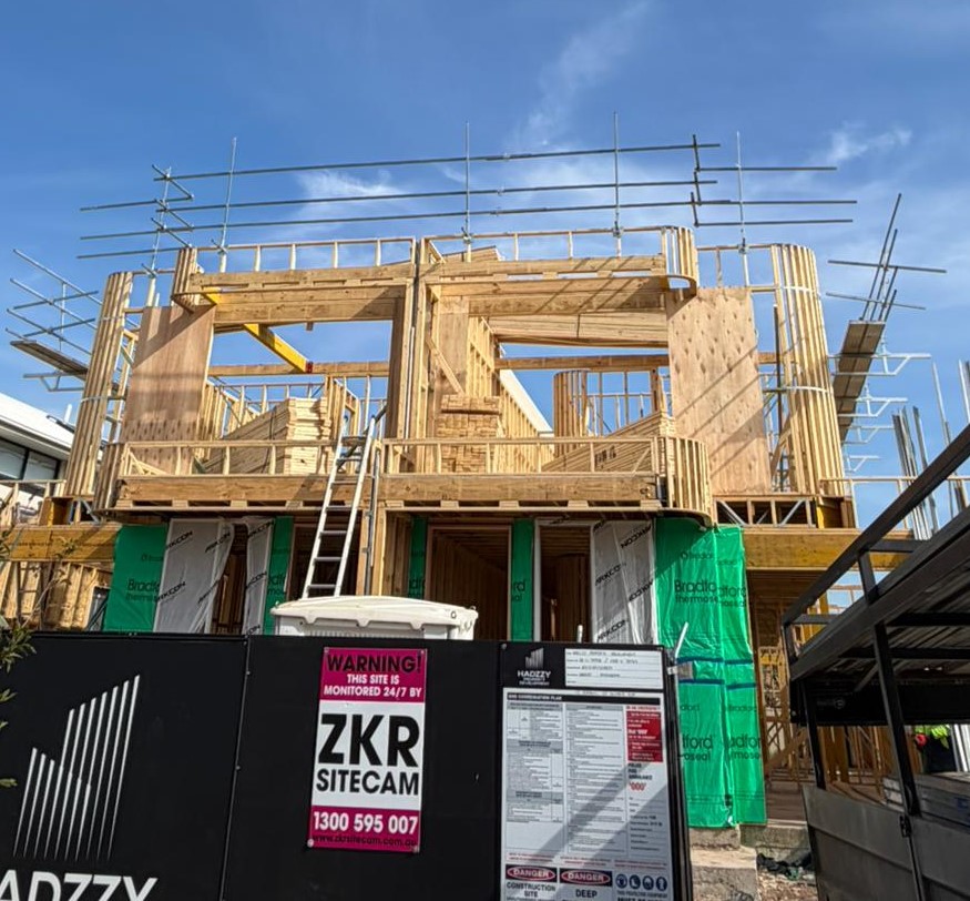 Roof edge protection barrier system on elevated structure