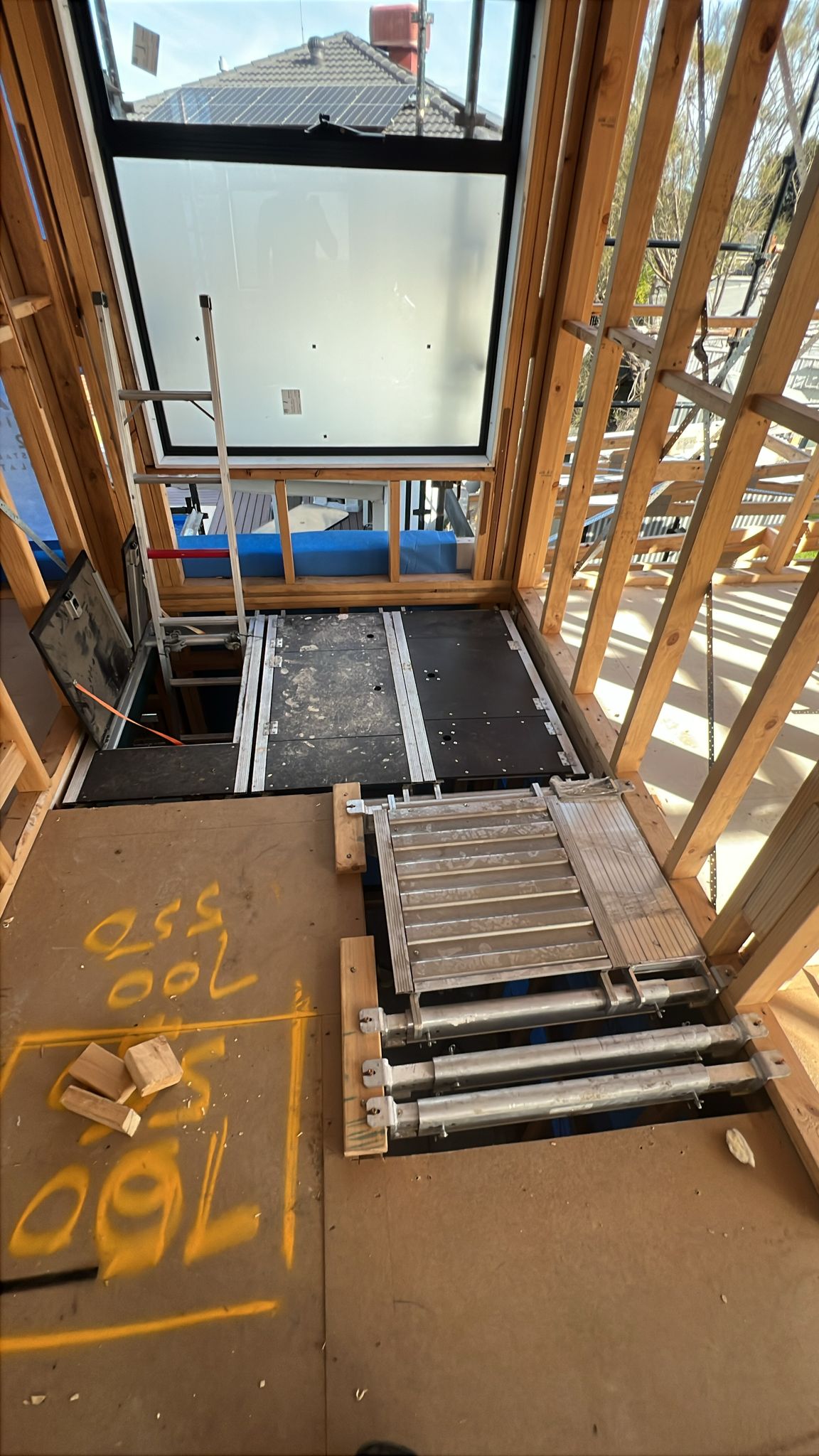 Stair void protection barriers in active construction zone